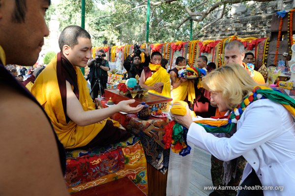 The KHCP team offers a mandala to Karmapa Monlam
