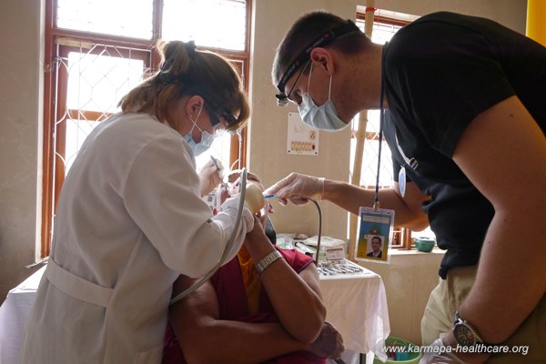 Dentist Dr.Daniela and assistant Mike treat day and night
